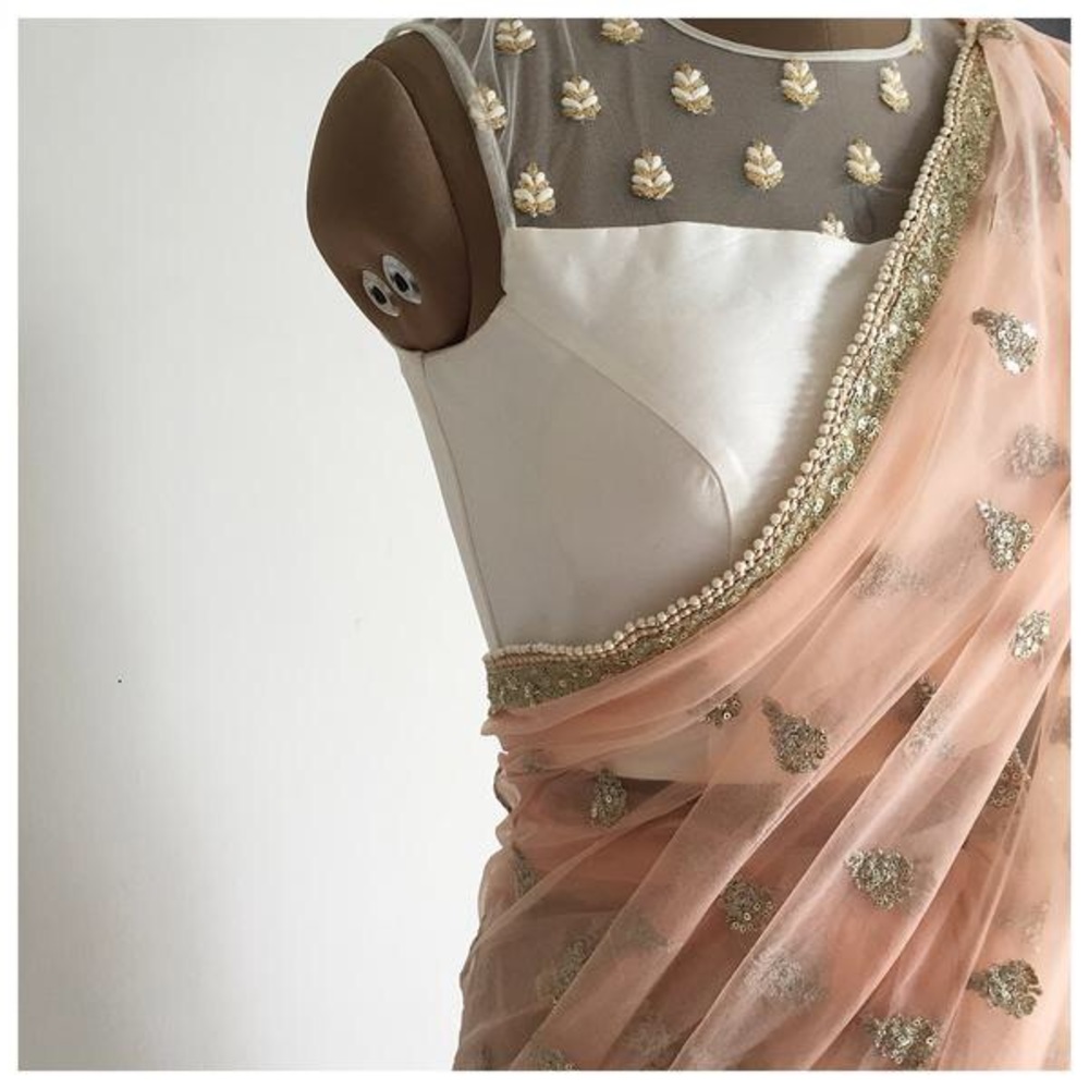 Elegant Peach and White Embroidered Saree
